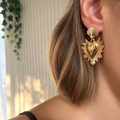 Boucle d'oreille bon coeur